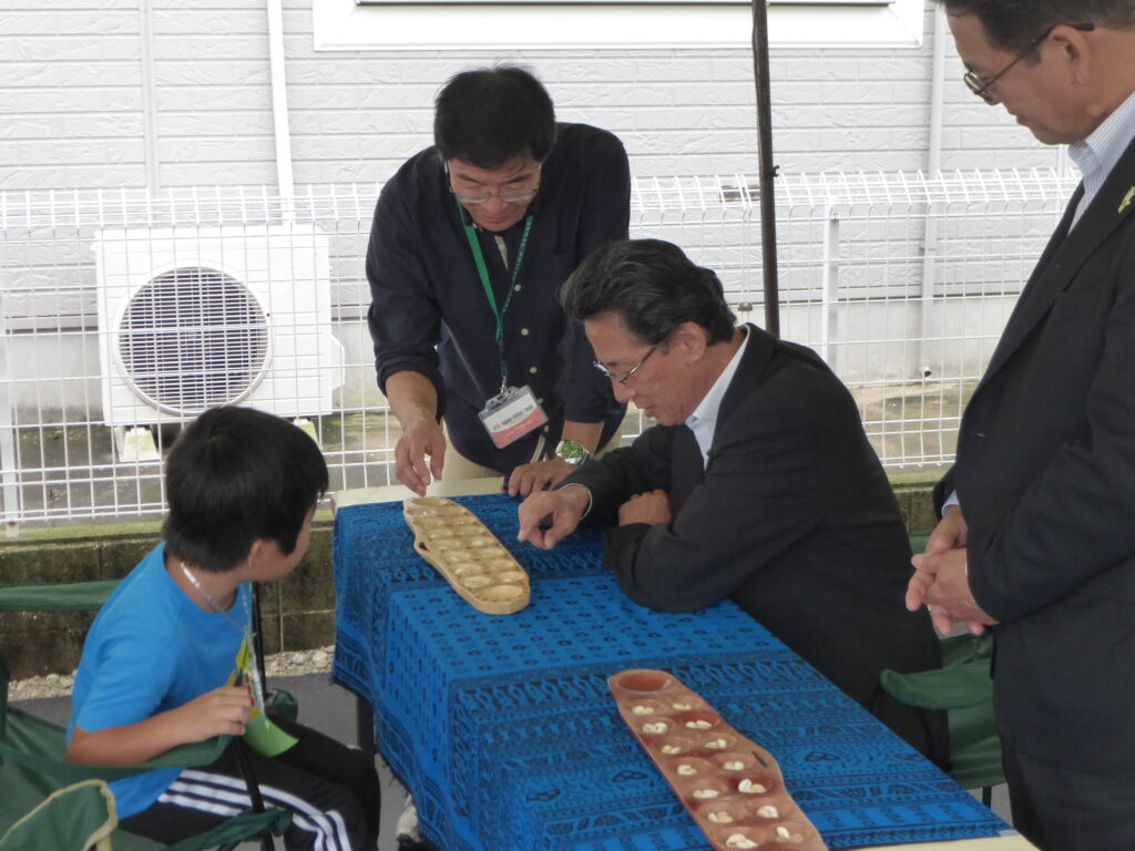 Mancala cultural exchange activity at a Yumeya Fund-related event