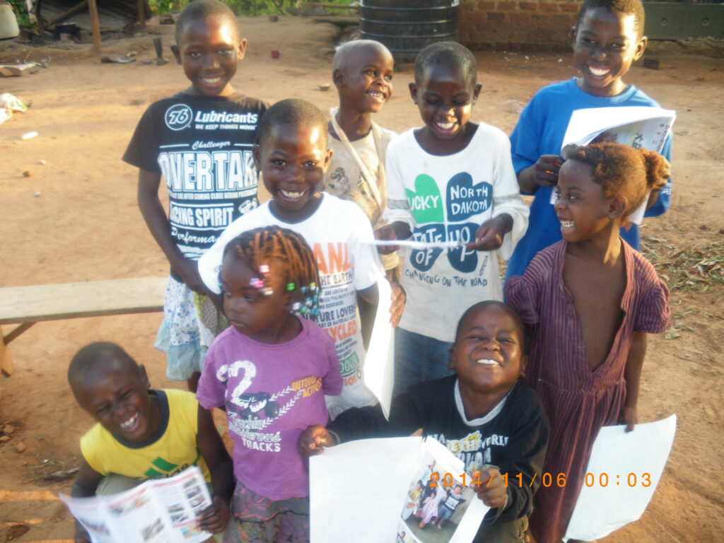 International exchange project connecting children in Uganda through T-shirts